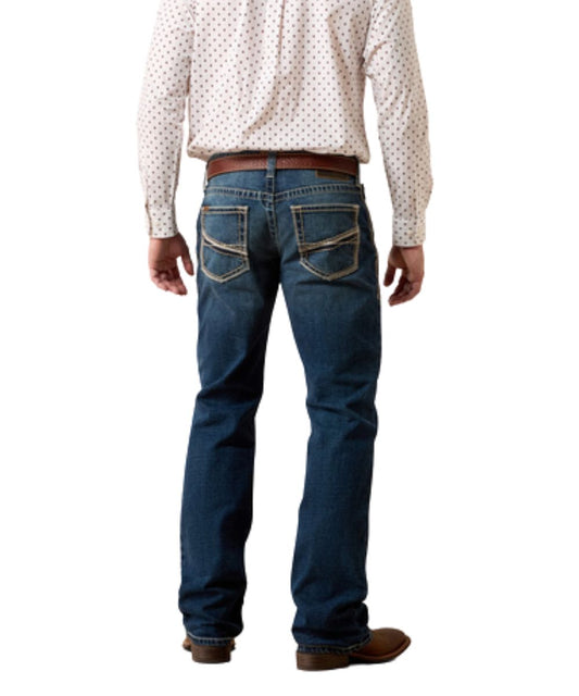 Back view of the men's dark wash boot cut jean featuring the mid rise and relaxed fit