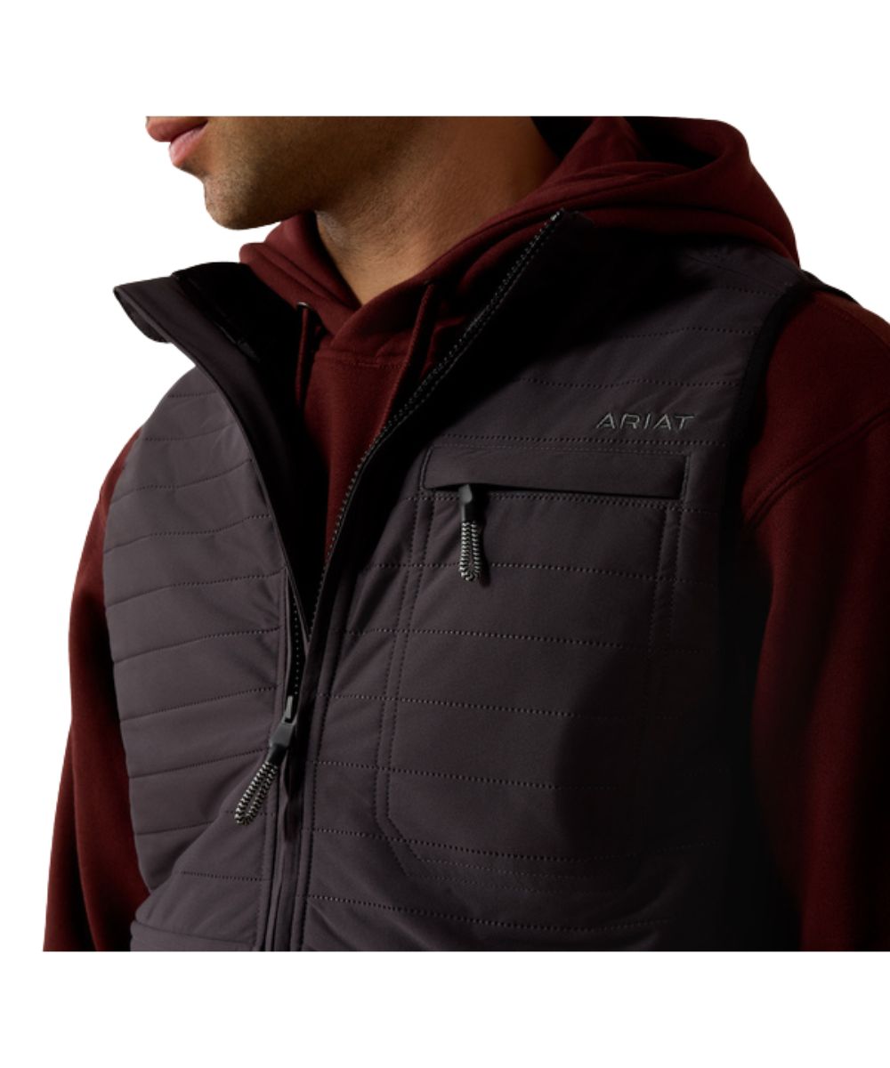 Close-up view of the zippered chest pocket, mandarin collar, and zip closure