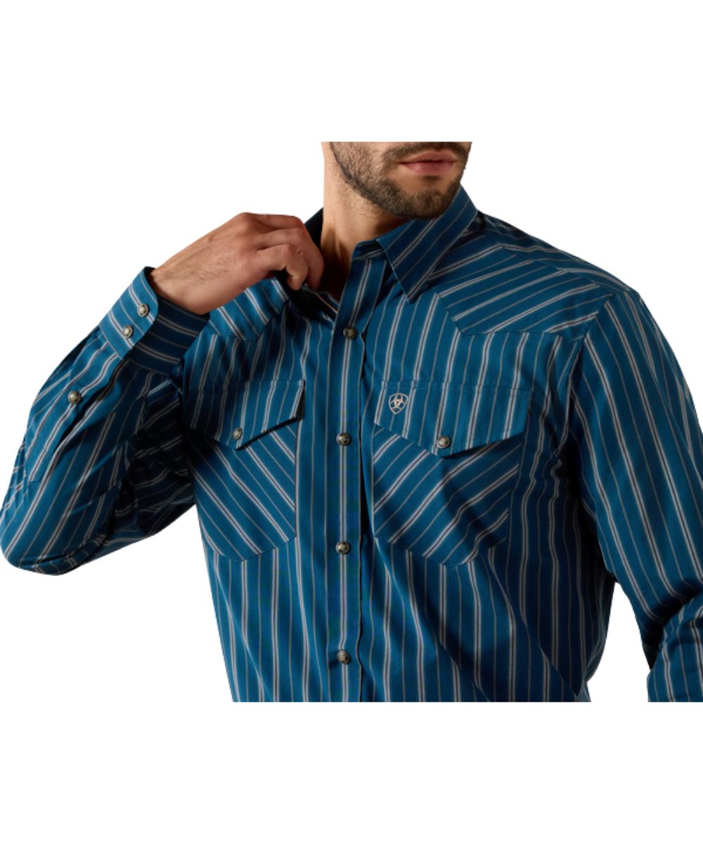 Close-up view of the sailor blue western snap shirt featuring the classic fit with extra length, western yokes, pearl snaps, and snap flap chest pockets with hidden pen slot