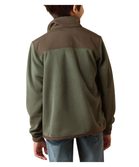 A child viewed from the back wearing a fleece pullover jacket with an olive green body and brown shoulder yoke, paired with blue jeans against a plain white background.