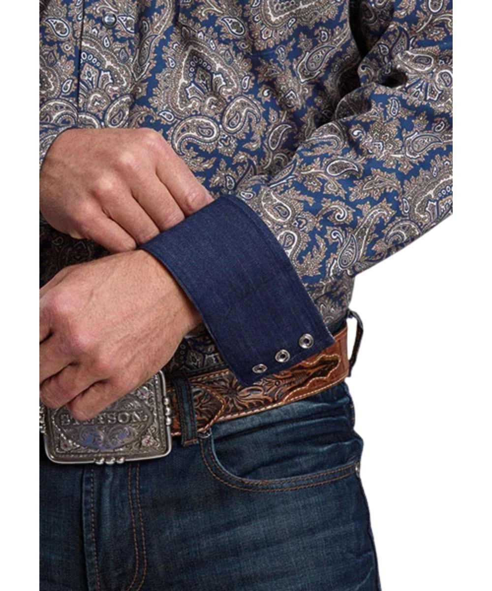 Close-up view of the navy and gold paisley print, 3-snap cuffs, and the contrast interior denim trim