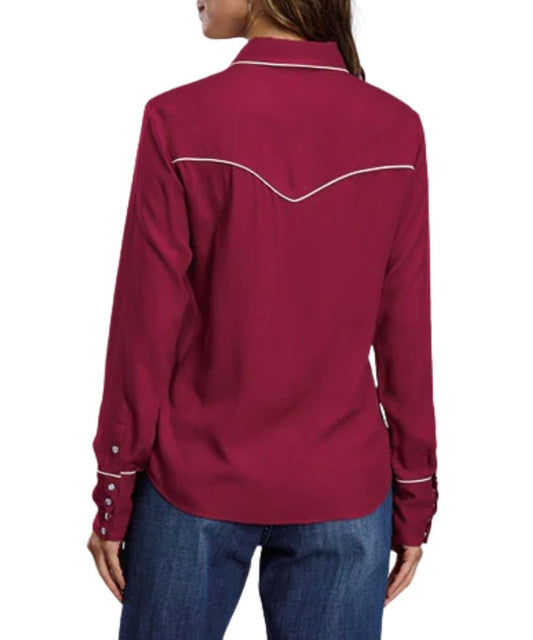 Back view of the women's wine long sleeve snap shirt featuring the single point back yoke with cream piping, and the 4-snap cuffs