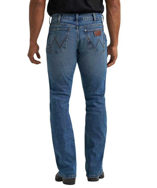 Back view of the men's retro harris slim boot cut jean in a medium wash