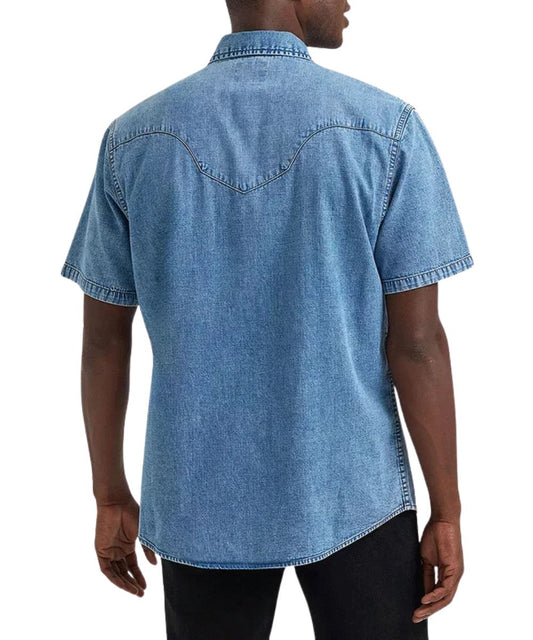 Back view of the men's light wash denim snap shirt featuring the vintage-curved back yoke
