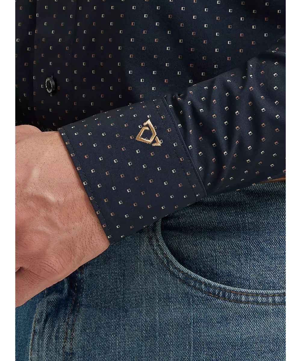 Close-up view of the mitered cuffs featuring COJO's signature logo embroidery