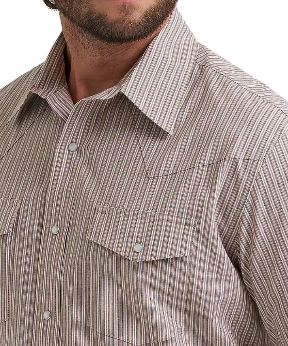 Close-up of a man wearing a western-style button-down shirt with a fine vertical stripe pattern in beige, cinnamon, and white.