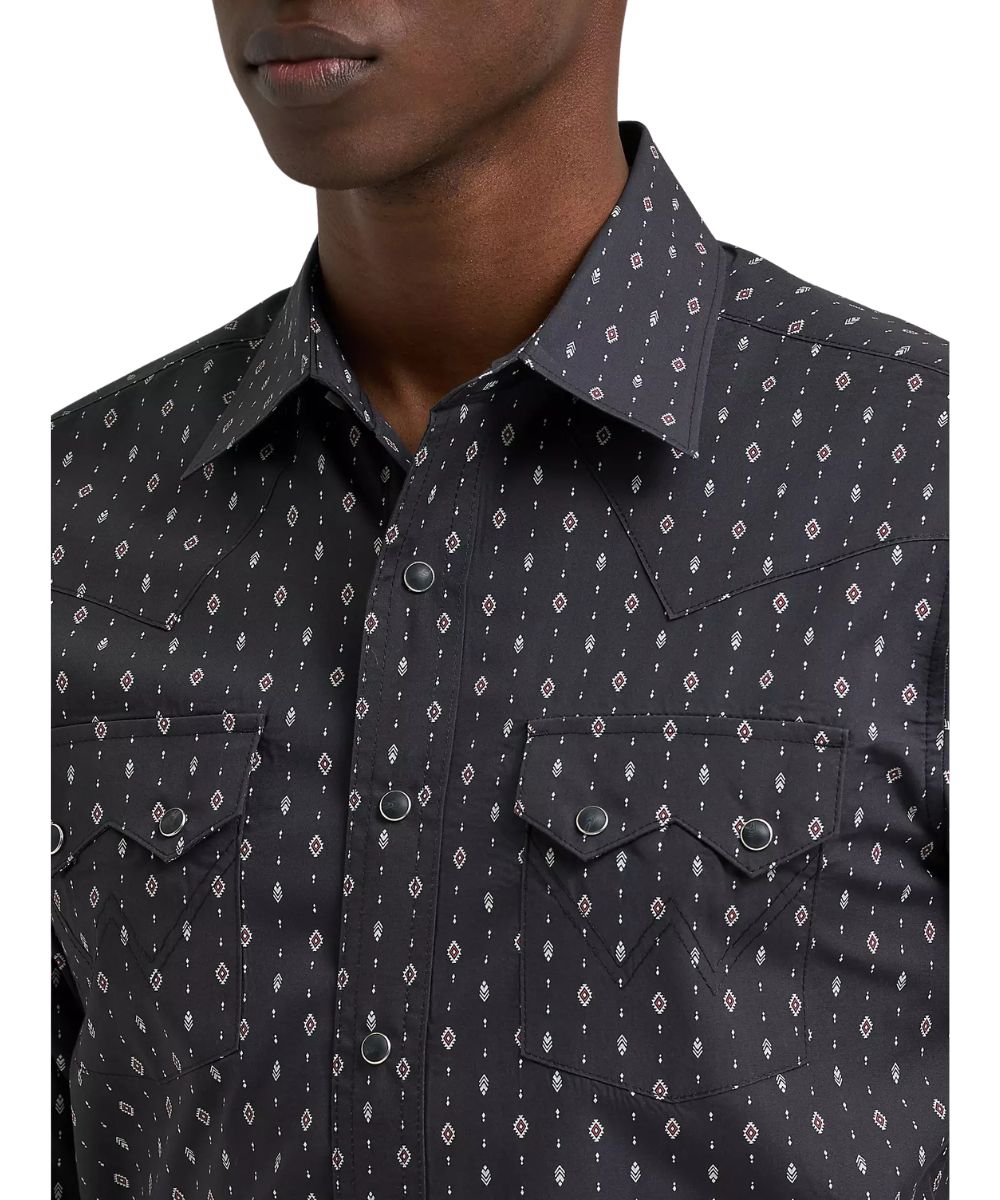 Close-up view of the sawtooth snap flap chest pockets, spread collar, western yokes, and geometric obsidian print on the men's black retro western shirt