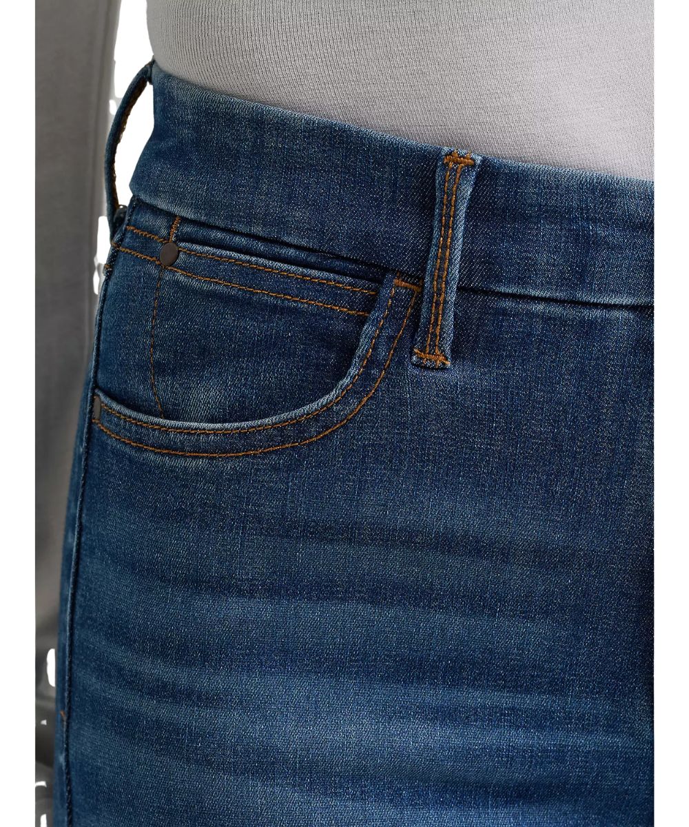 Close-up view of the five pocket styling and 10" front rise on the women's dark wash trouser jean