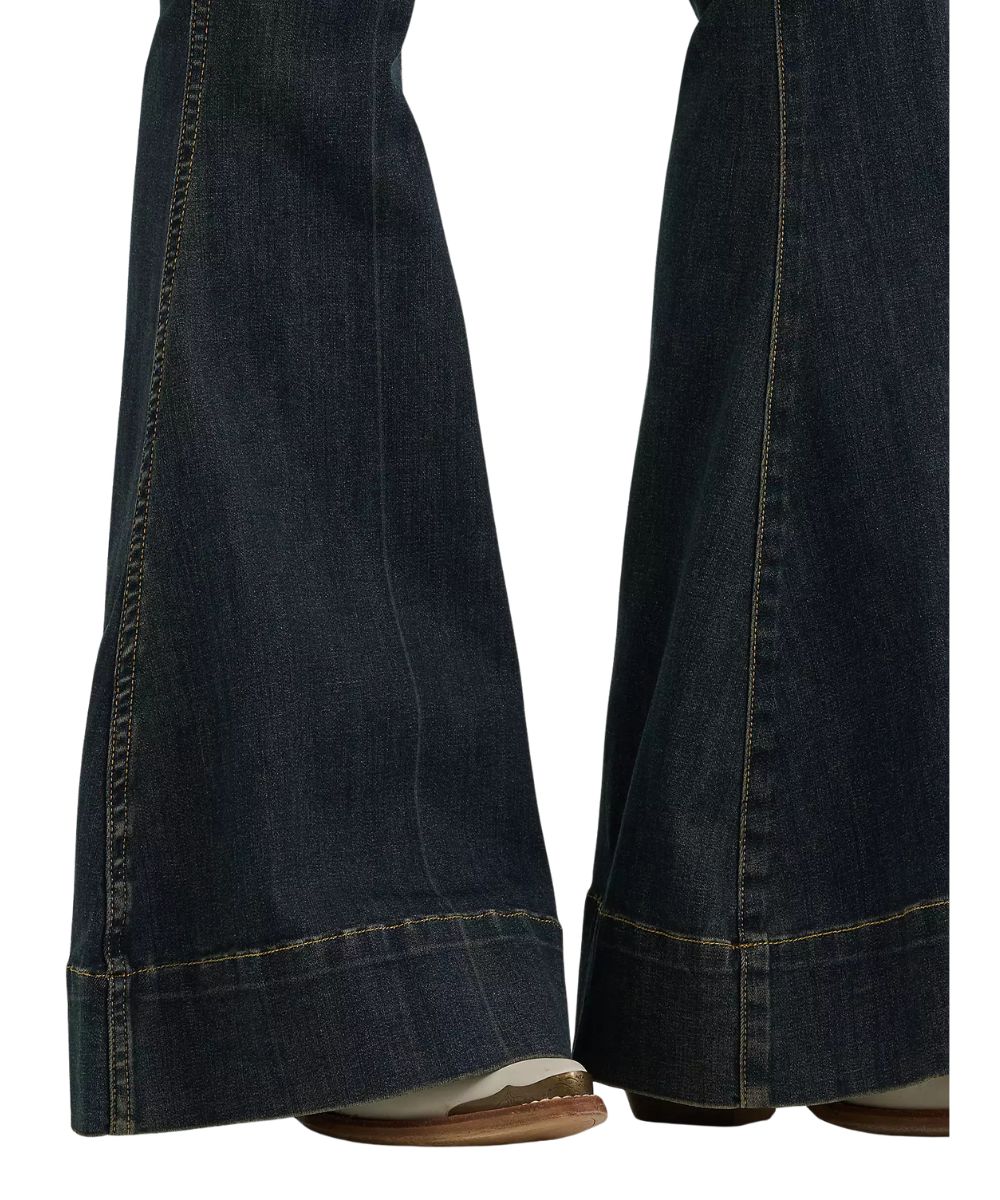 Close-up view of the trouser hem on the women's bell bottom jean featuring the 34" flared leg opening