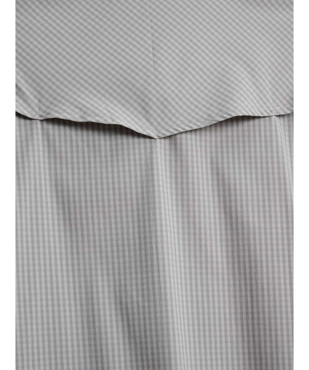 Close-Up View Of The Grey Check Plaid Print And Vented Yoke