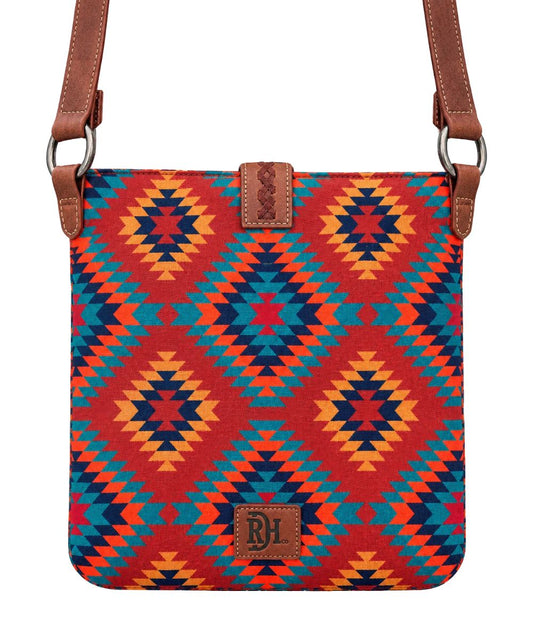 Back view of the women's crossbody purse featuring the aztec body and logo patch on the back