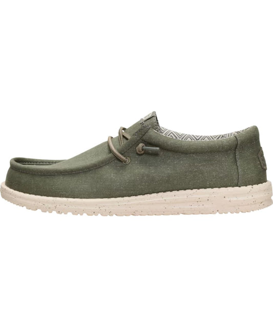 Left side view of the men's tea leaf/parchment wally stretch canvas shoe