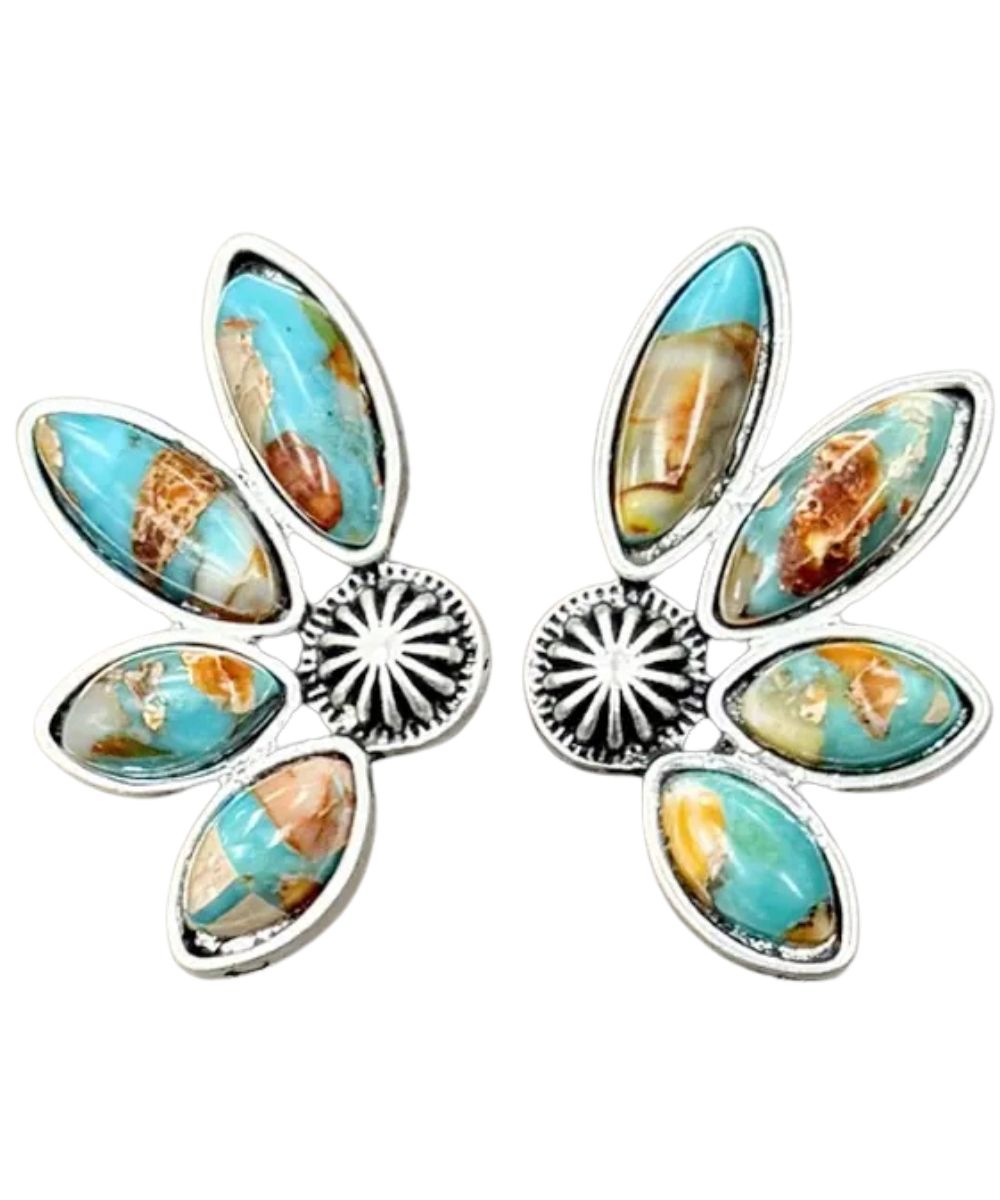 Flat lay view of the women's gemstone earrings