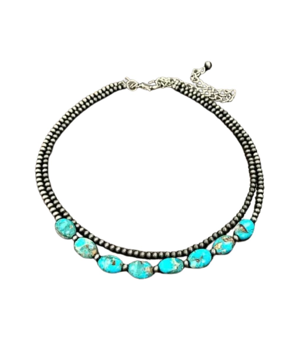 Flat view of the women's western necklace that is 15" long with a 5" extender