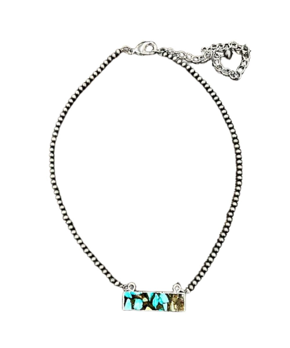 Flat lay view of the women's 15" necklace with a 5" extender