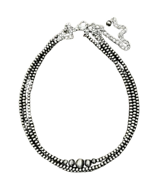 Flat lay view of the women's 15" necklace with a 5" extender