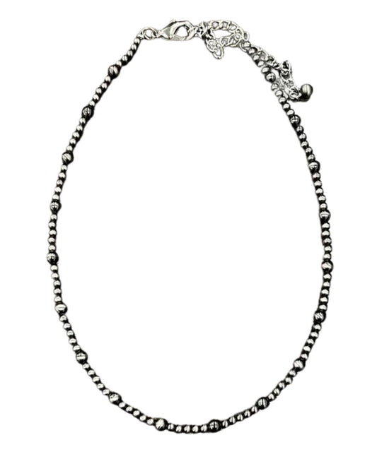 Flat view of the women's silver navajo style western necklace featuring the 16" length with a 5" extender