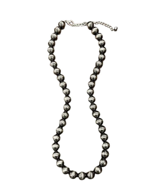 Flat view of the women's navajo-style necklace featuring the 24" length with a 5" extender and a lobster claw clasp closure
