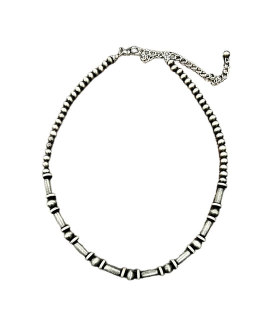 Flat view of the women's faux navajo pearl beaded necklace