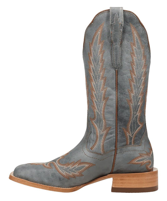 Side view of the women's 12" shaft Denita western boot featuring brown piping and western stitching, leather construction, and leather pull tabs.
