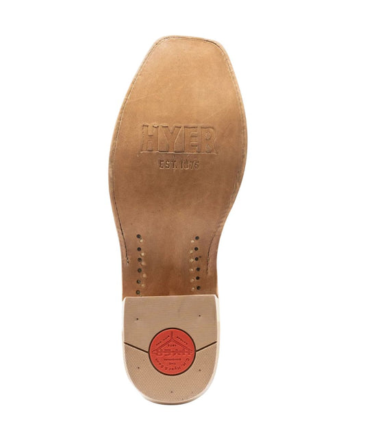 Sole view of the oiled leather outsole featuring the cutter underslung, leather stacked heel