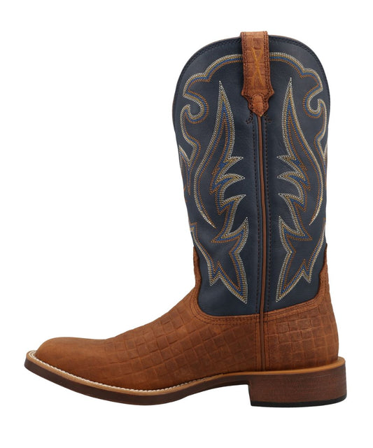 Left side view of the men's 13" top hand boot featuring a chestnut brown embossed leather vamp and a navy blue leather shaft with contrast stitching