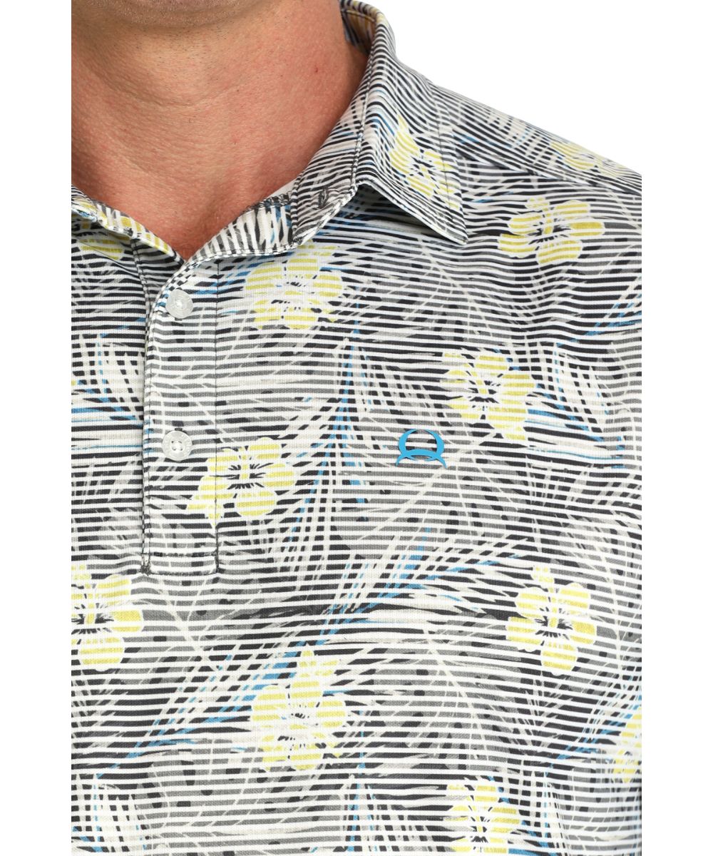 Close-Up View Of The Sublimated Hawaiian Print Featuring The Spread Collar And 3-Button Polo Placket
