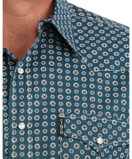 Close-up view of the white contrast topstitch and the geometric print