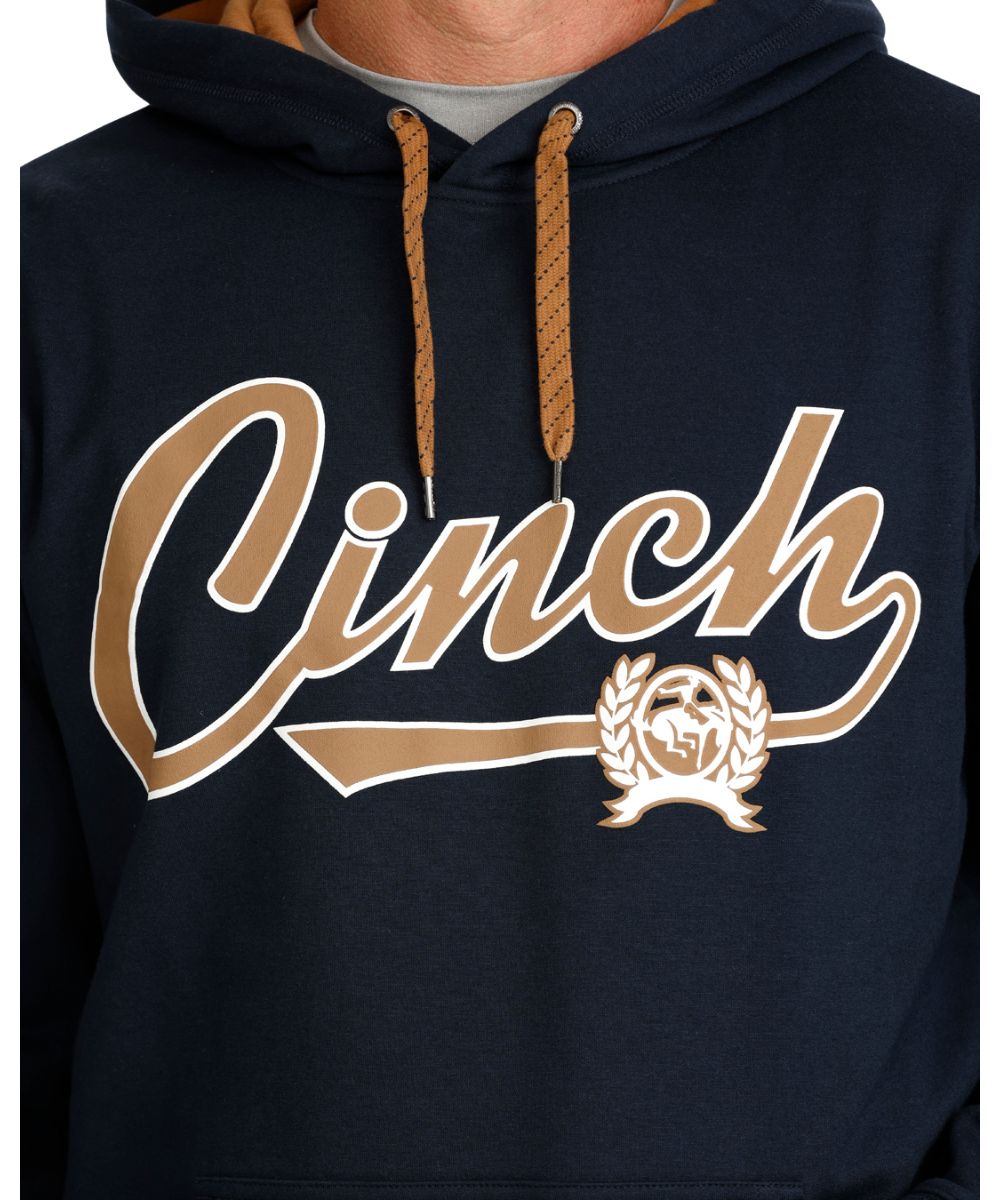 Close-up view of the contrast screen-printed logo on the men's navy hoodie