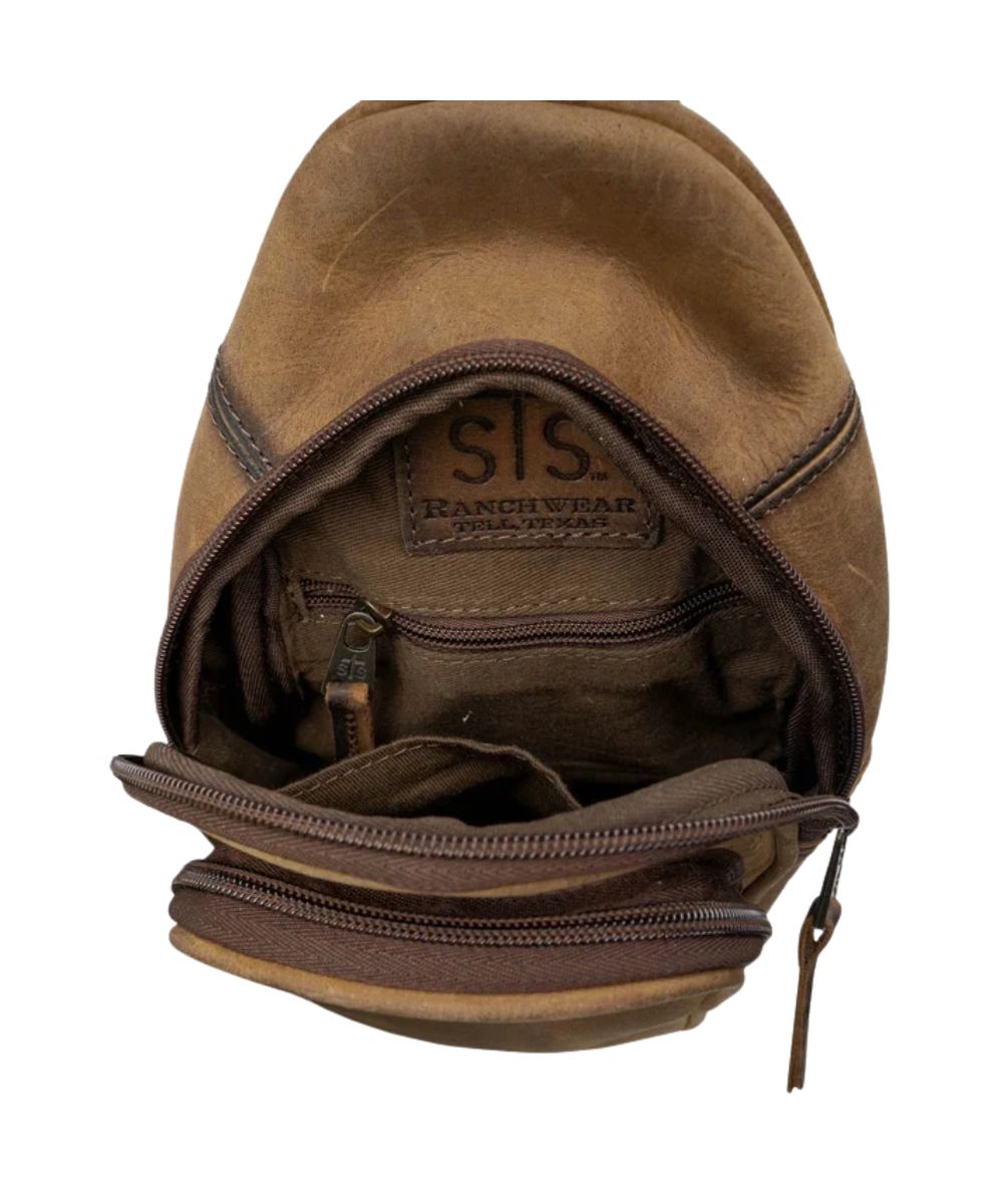 Interior view of the main compartment featuring a zip pocket and a slip pocket