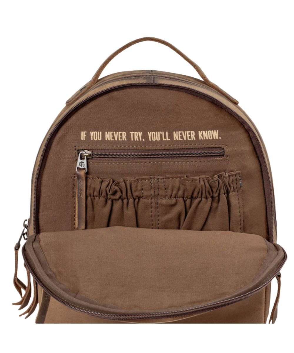 Quote inside that reads: "If You Never Try, You'll Never Know." above the interior scrunch and zipper pockets