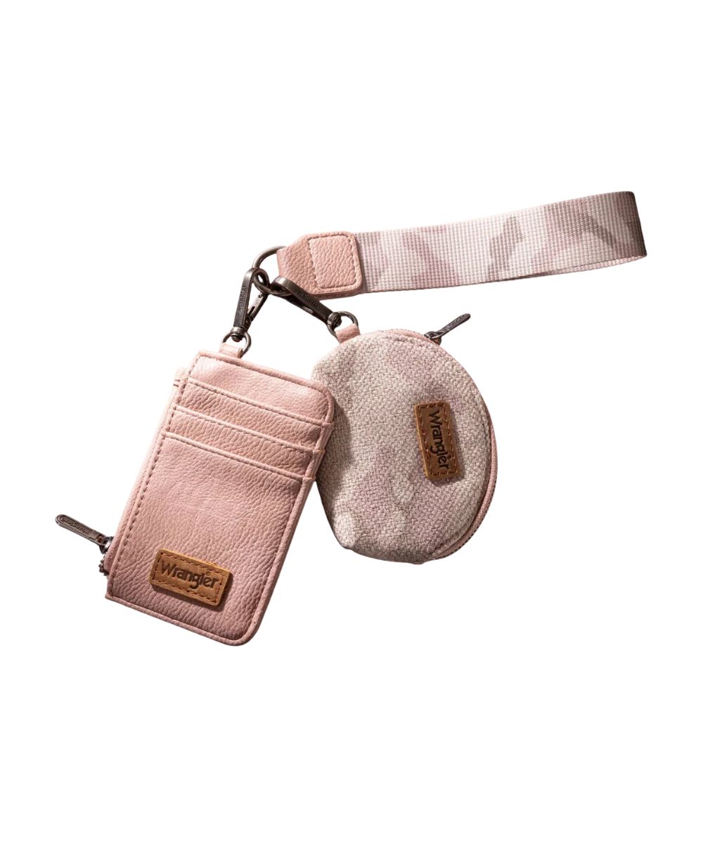 Side view of the women's pink camo Wrangler dual pouch wristlet set featuring the square-shaped solid pink card holder and the semi-circular zipper camo coin purse, with the pink camo wristlet strap
