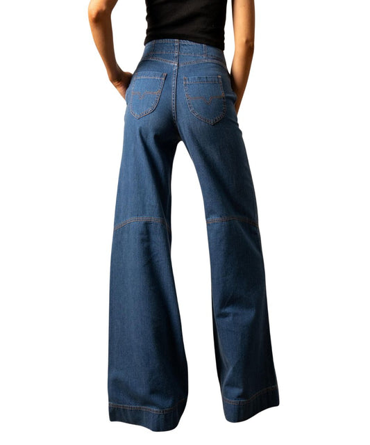Back view of the women's high rise Kimes Jean featuring the longhorn logo embroidered back pockets, accent stitching at the knee, wide leg, trouser hem, and a left side zipper entry
