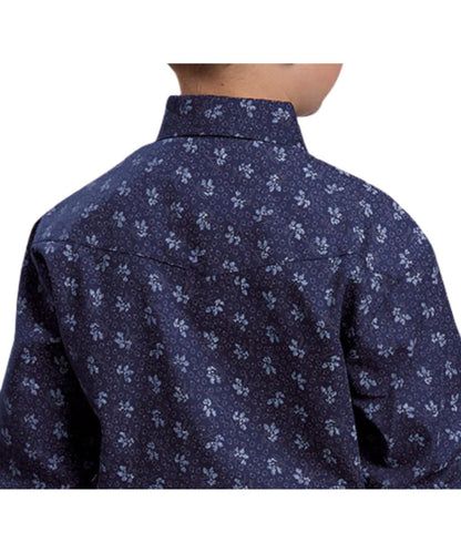 Back view of the boy's long sleeve navy blue snap shirt featuring the light grey floral striped print and western yoke