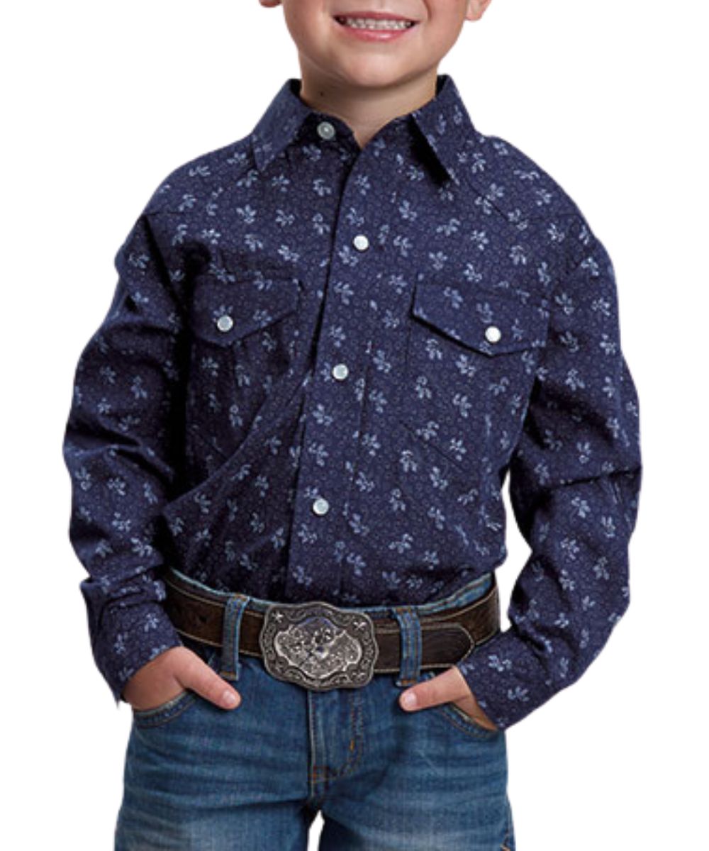 Front view of the boy's Roper navy blue long sleeve snap shirt featuring the chest pockets, light grey wallpaper floral striped print, and western yokes