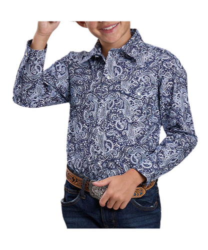 Front view of the boy's long sleeve western snap shirt featuring a blue paisley print