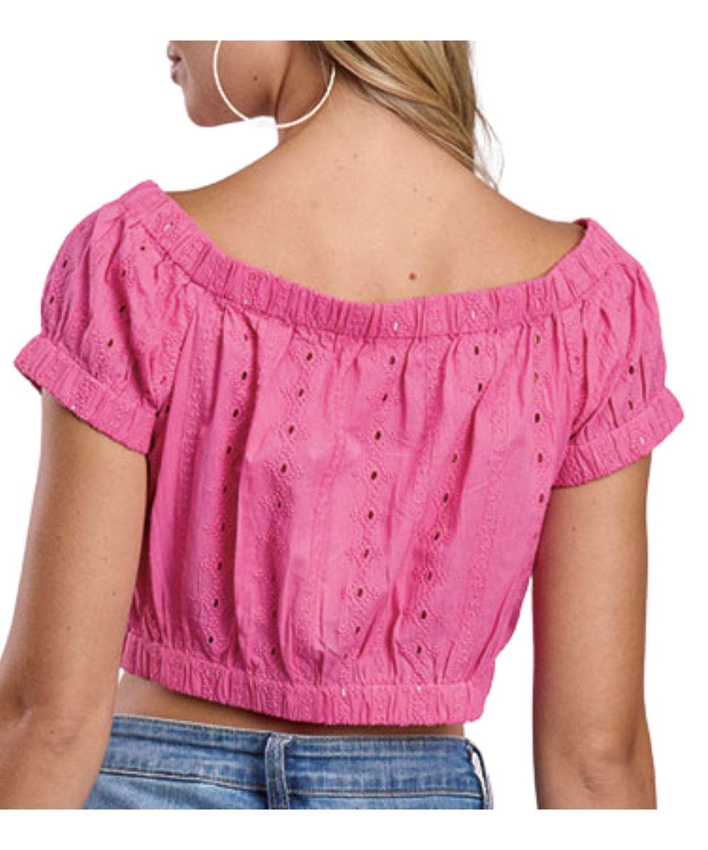 Back view of the women's magenta pink eyelet crop top can be worn off the shoulders
