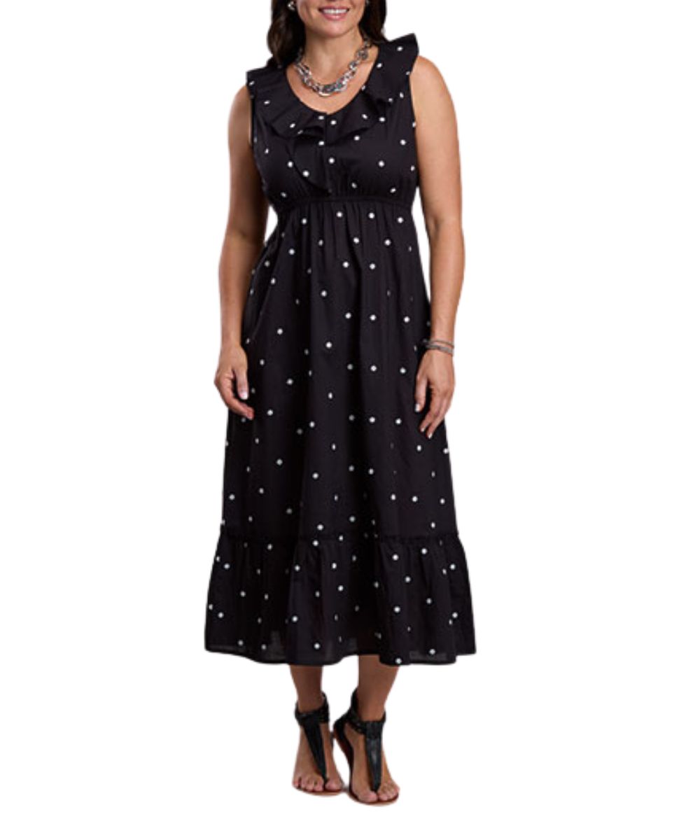 Front view of the women's black cambric dress with white embroidered polka dots, ruffled collar, elastic waist, and ruffled hem