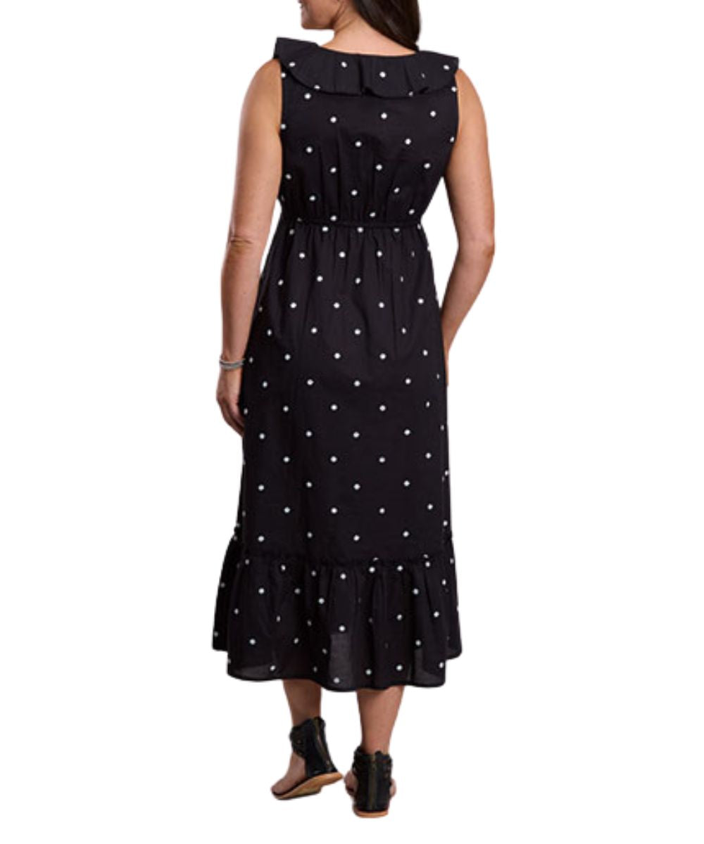 Back view of the women's black dress with white polka dots featuring a midi length