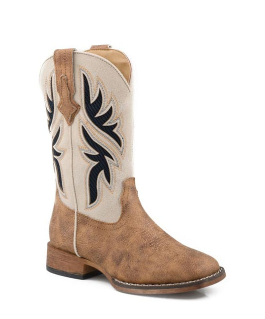 A western-style cowboy boot with a distressed tan leather foot and a cream shaft featuring black embroidered stitching, shown against a plain white background.