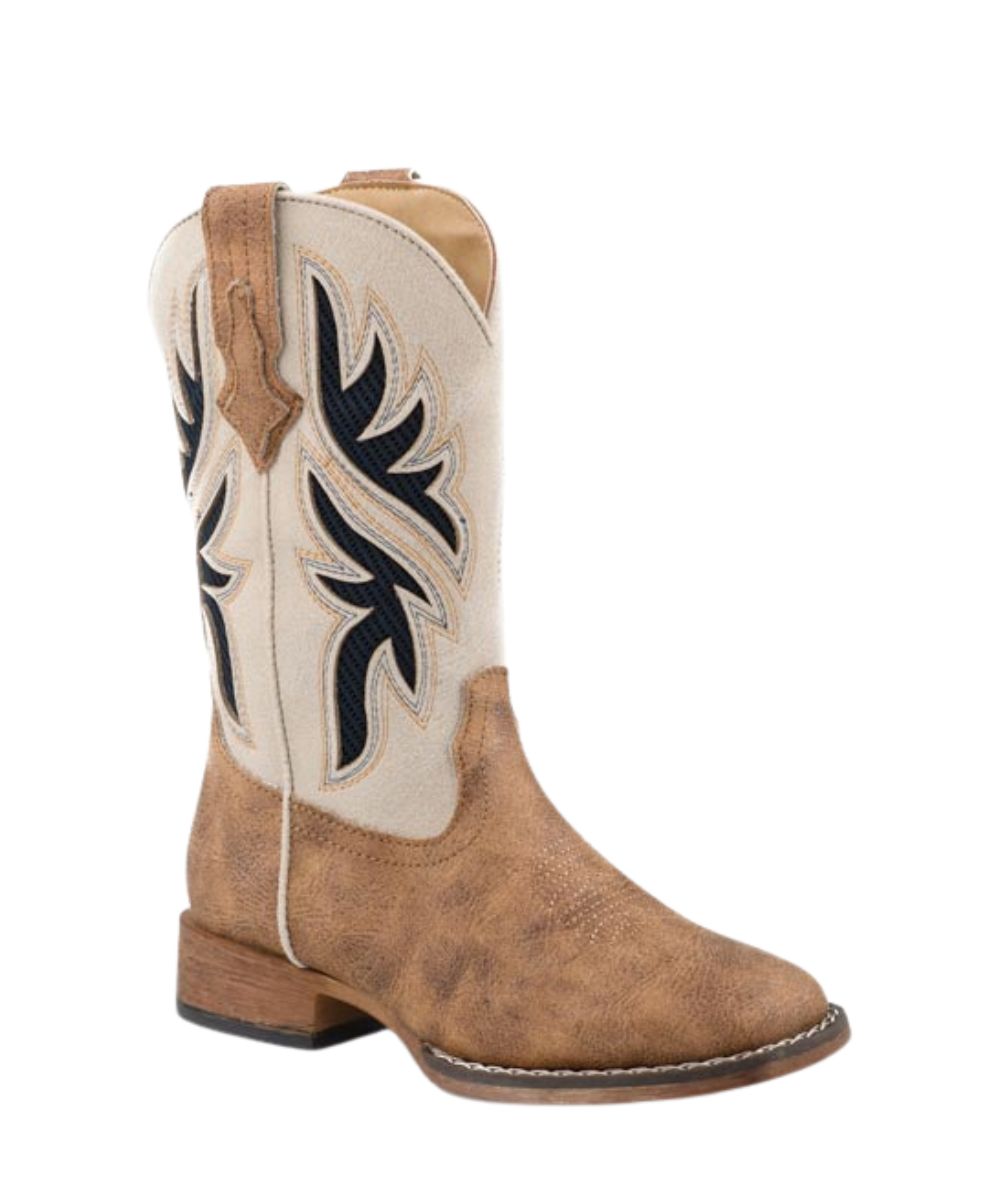 A western cowboy boot in distressed tan leather with a cream shaft featuring black embroidered leaf patterns, shown against a plain white background.