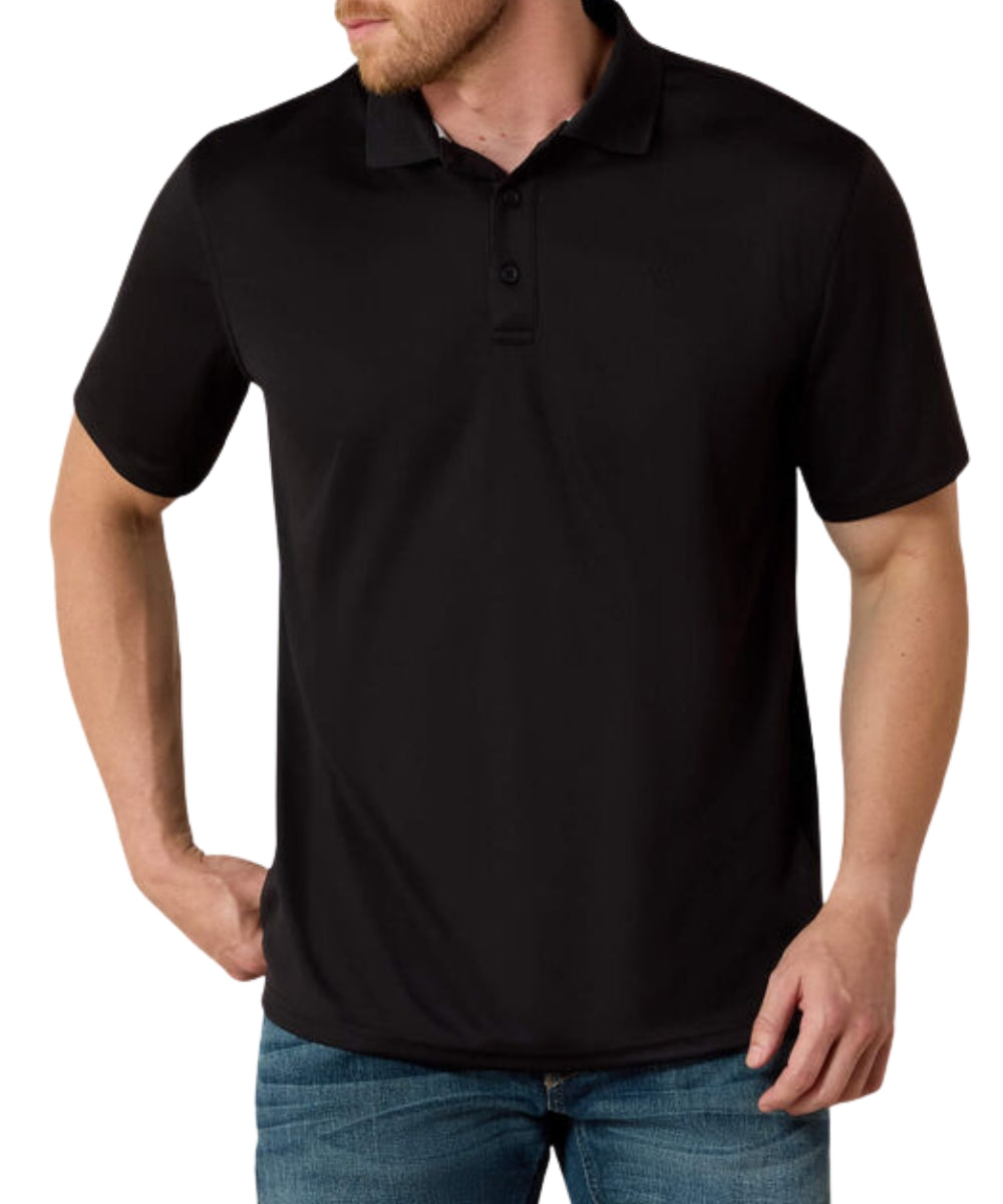 A man wearing a black short-sleeve polo shirt with blue jeans, shown from the chin down against a plain white background.