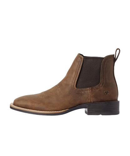 Left side view of the men's 6" chelsea booker boot featuring dual elastic gore panels and a heel pull tab for easy on entry