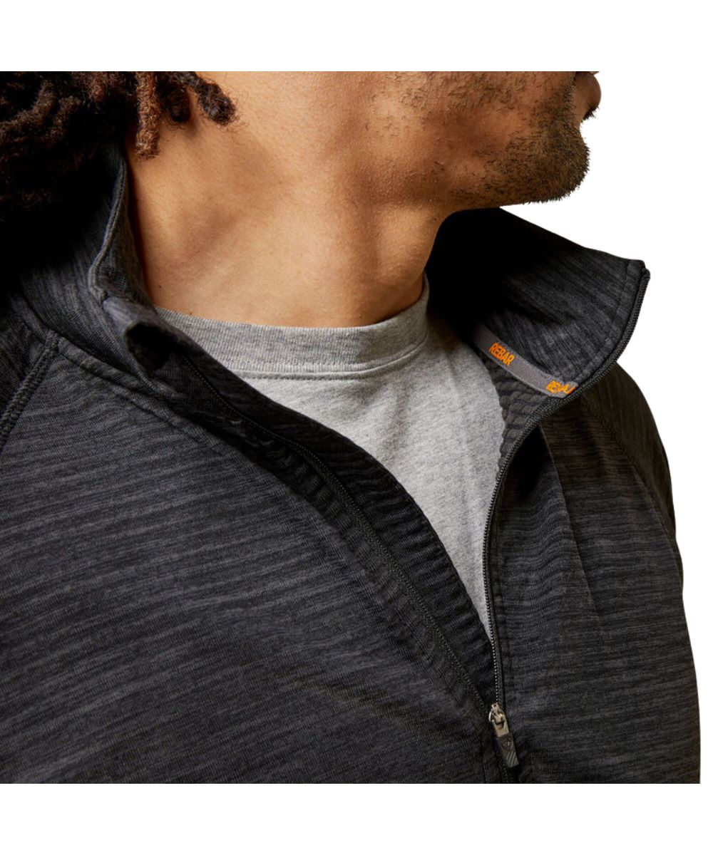 Close-up view of the fleece fabric, 1/4 zip closure, and mock collar on the men's gridwork baselayer 1/4 zip shirt.