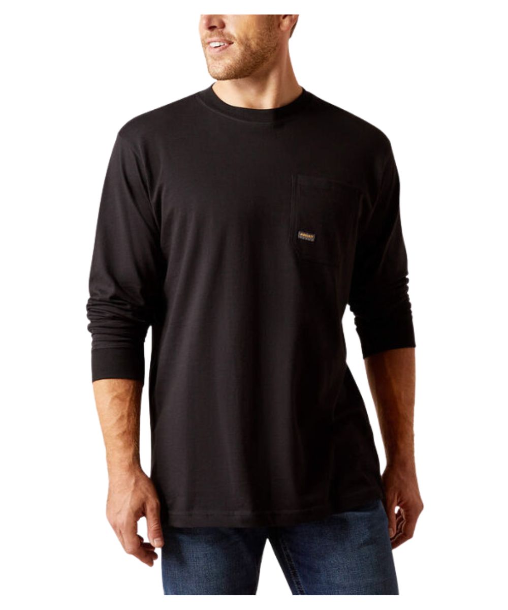 A man wearing a black long-sleeve crewneck t-shirt with a chest pocket, paired with blue jeans, shown against a plain white background.
