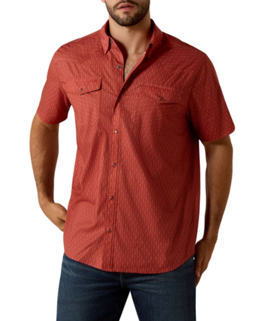 Front view of the men's short sleeve chili oil snap shirt featuring snap flap chest pockets, western yokes, and a geometric print