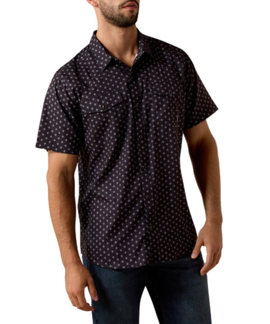 Front view of the men's geo print black short sleeve snap shirt featuring chest pockets, slim fit, and performance fabric
