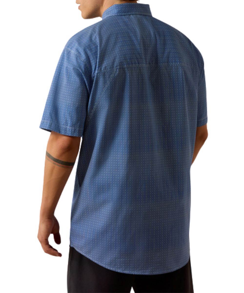 Back view of the men's blue quartz 360 airflow button down shirt featuring the perforated panels for airflow enhancement, and the geometric print