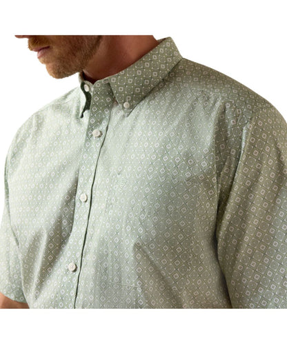 Close-Up View Of The Single Open Chest Pocket, Button Down Collar, And Wrinkle Free Southwestern Printed Fabric