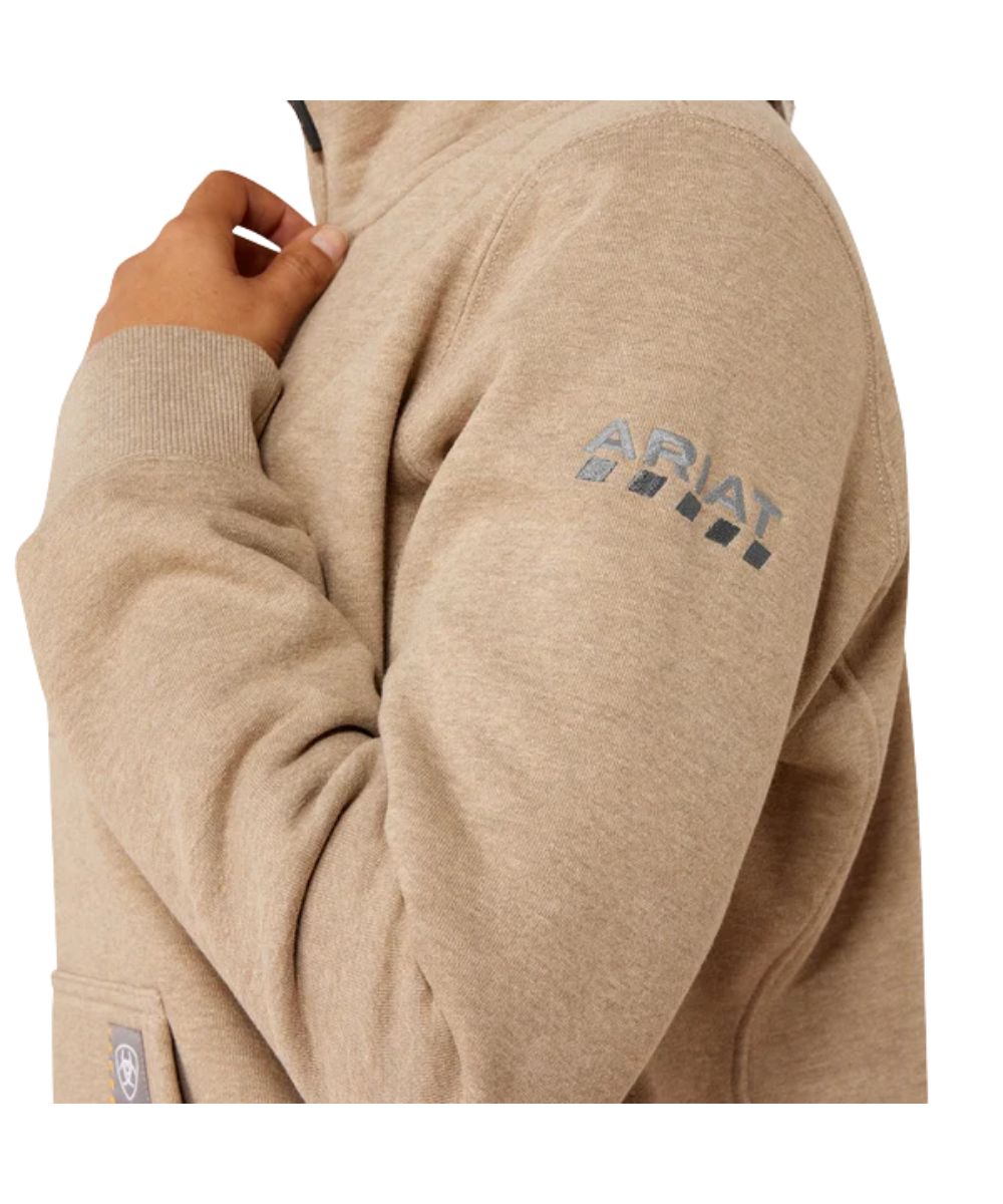 Close-up view of the embroidered logo on the sleeve